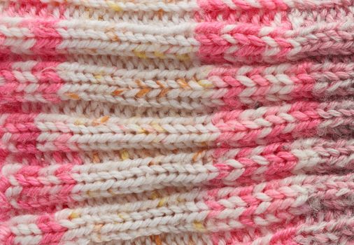 knitted pink texture, full frame, warm woolen clothes, close up