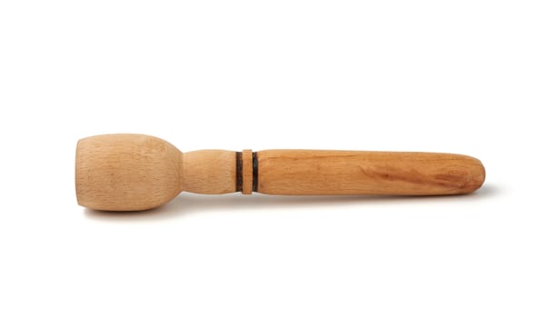 new wooden mortar pestle isolated on a white background, close up