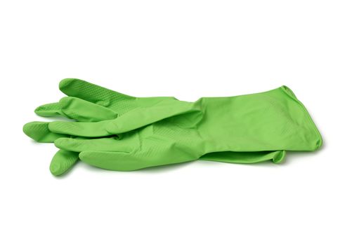 green rubber gloves for cleaning washing dishes isolated on white background, close up