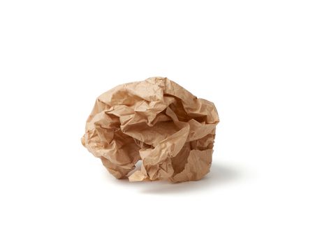 crumpled ball of brown sheet of parchment paper isolated on white background, element for designer