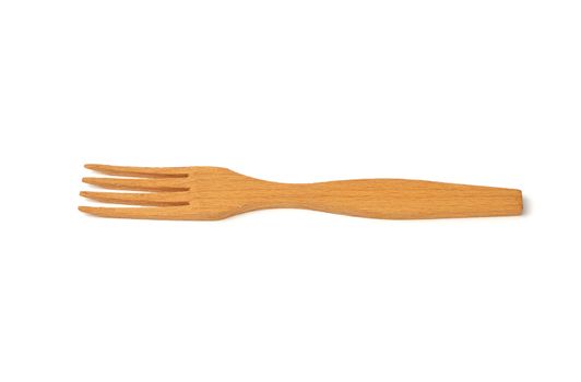 wooden yellow fork isolated on white background, vintage appliance