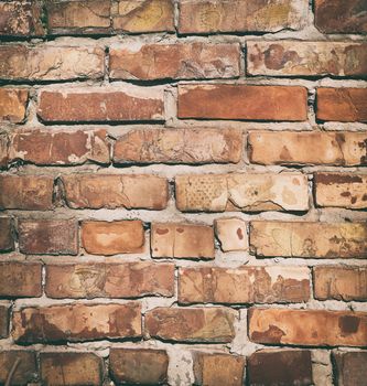 red brick old wall with cement, fragment of architecture