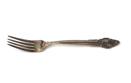 metal vintage fork isolated on white background, item for table setting