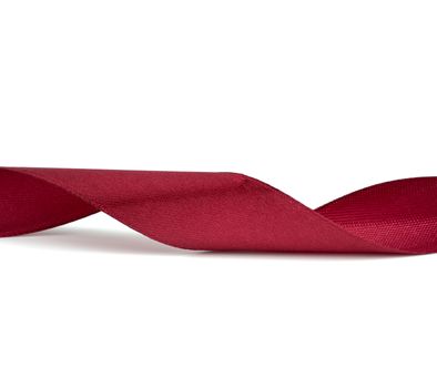 twisted burgundy silk ribbon isolated on white background, close up