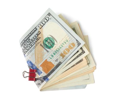 USA paper money bent in half and isolated on a white background, concept of salary, benefits