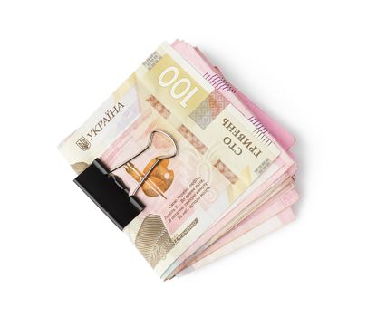 folded stack of paper notes of Ukraine, face value 100 hryvnia, money isolated on a white background