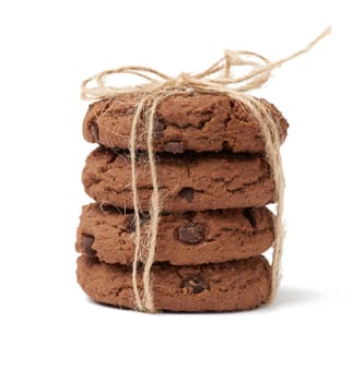 stack of baked round chocolate chip cookies isolated on a white background, close up
