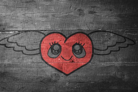 heart with wings against overhead of wooden planks