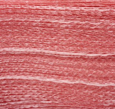 texture of pink paper napkins, full frame, close up