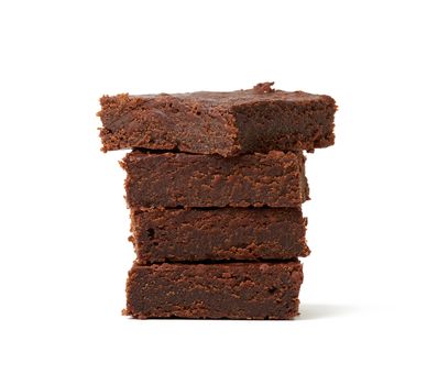 stack of square baked pieces of brownie chocolate cake isolated on a white background, delicious dessert, element for the designer