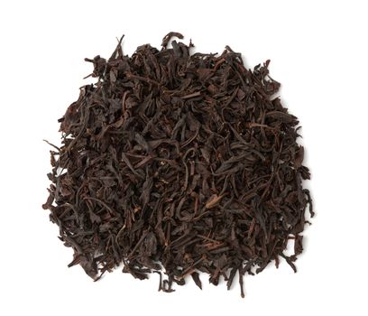 dry black long leaf tea, top view, ingredients for a hot drink, close up