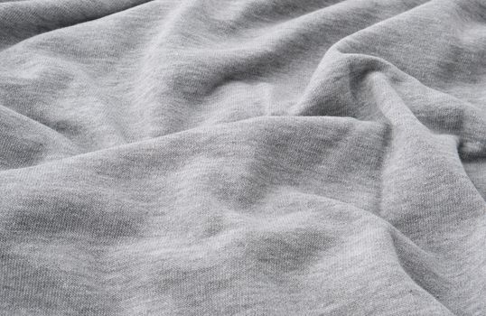 gray cotton stretch fabric for sewing clothes, canvas with waves, close up