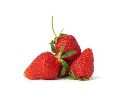 whole ripe red strawberries isolated on a white background, close up
