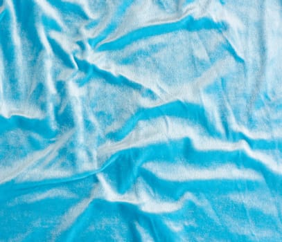 blue velvet texture with waves, element for the designer, full frame. Design template.
