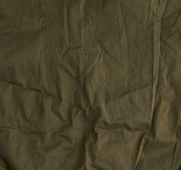 khaki crumpled cotton fabric for sewing clothes, full frame