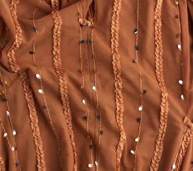 brown tulle with sequin embroidery and decor, textile for sewing clothes, full frame