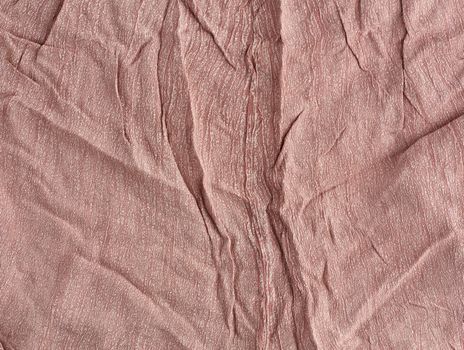 crumpled brown cotton fabric, fabric for sewing clothes and shirts, full frame