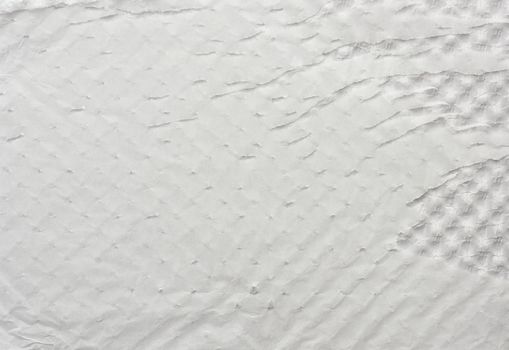 wrinkled and damaged sheet of white paper, element for the designer, full frame