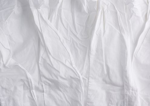 crumpled white cotton fabric, fabric for sewing clothes and shirts, full frame