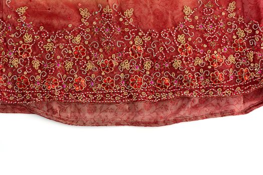 red tulle with sewn red round sequins and embroidered bead pattern, fabric for sewing clothes, full frame. skirt bottom