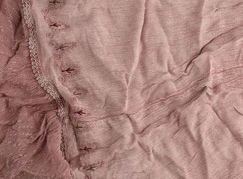 crumpled brown cotton fabric, fabric for sewing clothes and shirts, full frame