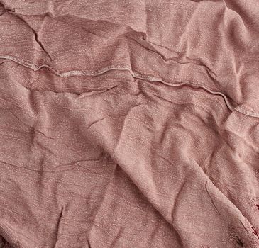 crumpled brown cotton fabric, fabric for sewing clothes and shirts, full frame