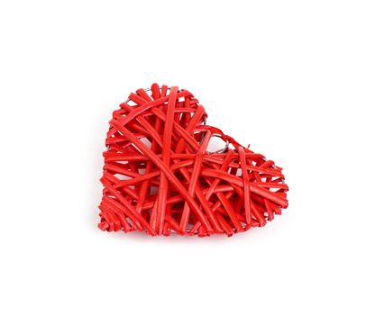red wicker decorative heart on a white background, festive backdrop for Valentine's day