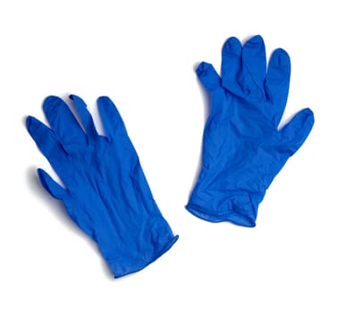 pair of blue medical rubber gloves for carrying out procedures and manipulations with a doctor, subject is isolated on a white background