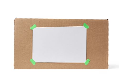 brown square cardboard box for transporting goods isolated on white background, close up