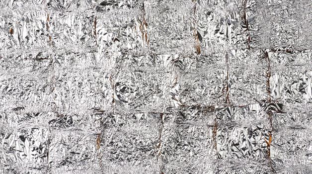 crumpled candy wrappers texture, foil, close up
