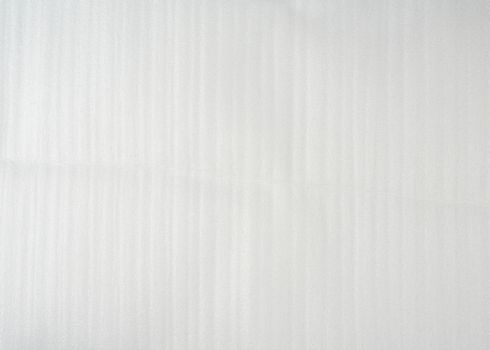 texture of white foamed polyethylene for packaging and transportation of fragile goods and things, full frame