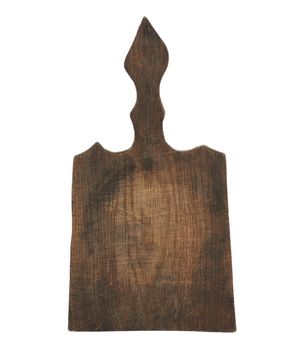 very old brown wooden carved kitchen cutting board with handle, utensils isolated on a white background