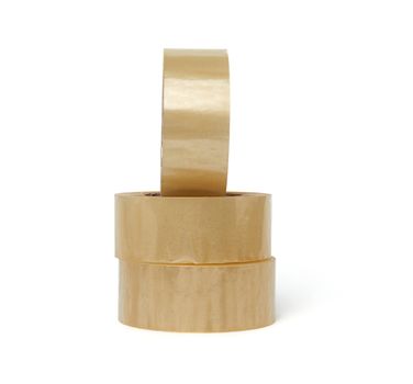 stack of transparent adhesive tape in round winding isolated on a white background, close up