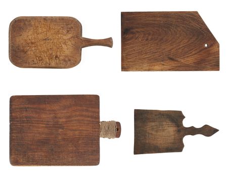 very old brown rectangular wooden kitchen cutting board with handle, utensils isolated on a white background, set