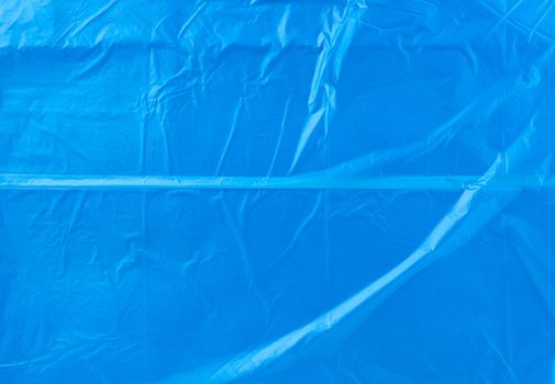 crumpled blue polyethylene texture, close up, full frame