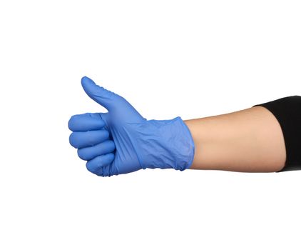 hand in blue medical glove shows right-handed gesture like on a white isolated background, concept of recommendation and approval