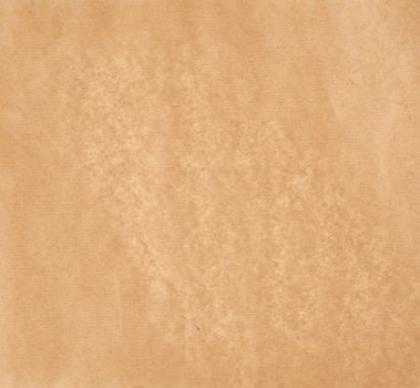 texture of light brown smooth parchment paper, full frame, close up