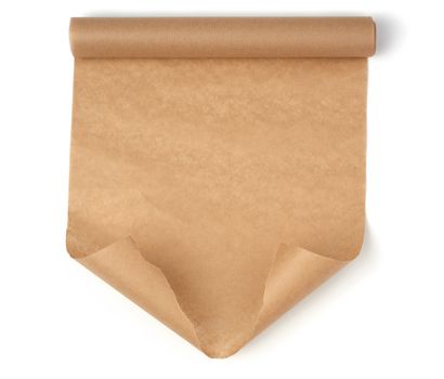 curled roll of brown parchment paper with curled edges isolated on a white background, place for an inscription, element for a designer