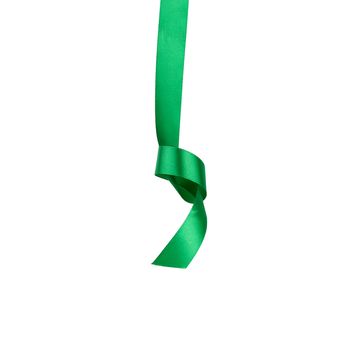 green silk ribbon hanging with a knotted and isolated on a white background, element for the designer