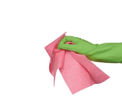 hand holds a pink rag for cleaning indoors, part of the body is dressed in a green rubber glove and isolated on a white background