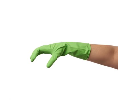 green rubber glove for cleaning is dressed on the hand, palm is open and conditionally holds the item