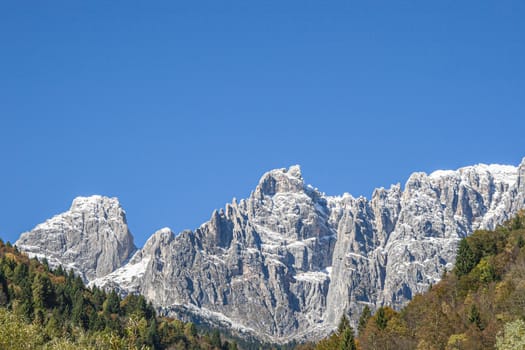 Mountain detail on Dolomites during day time in autumn