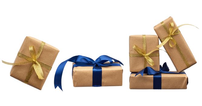 stack of gifts wrapped in brown kraft paper and tied with a silk blue ribbon and golden isolated on a white background, element for a designer, set