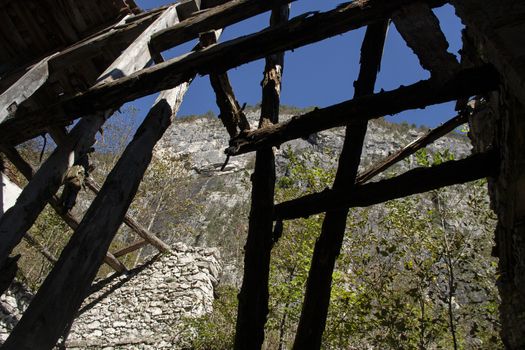 Ruin abandoned on the dolomites, an old abandone building from exterior