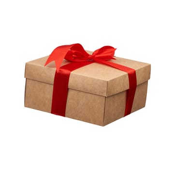 square box wrapped in brown kraft paper and tied with a silk red ribbon, side view, gift isolated on a white background