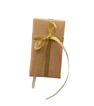 rectangle box wrapped in brown kraft paper and tied with a silk golden ribbon, gift isolated on a white background