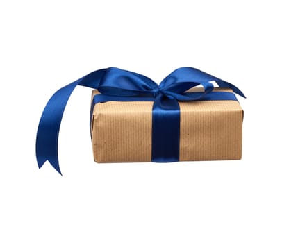 rectangular box wrapped in brown kraft paper and tied with a silk blue ribbon, side view, gift isolated on a white background