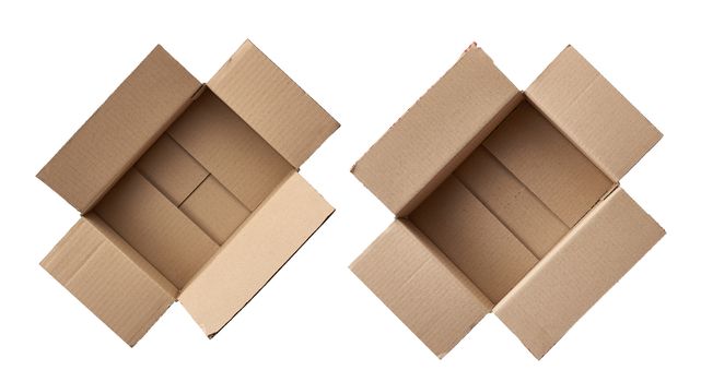 open empty brown square cardboard box for transporting goods isolated on white background