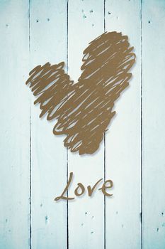 Love heart against painted blue wooden planks