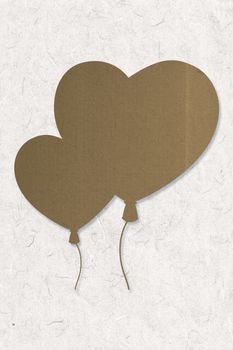 Heart balloons against parchment